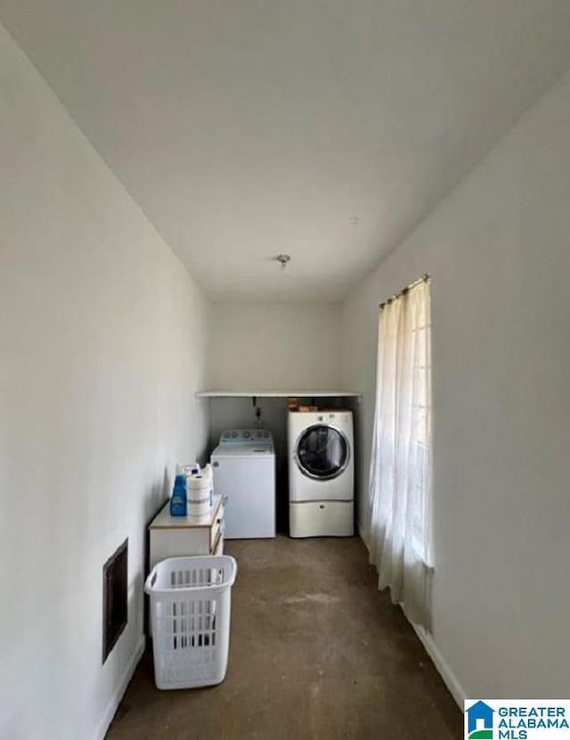 laundry area with washer and clothes dryer