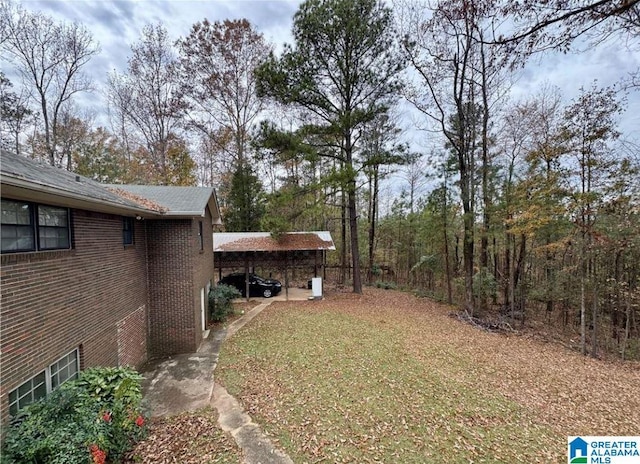 view of yard featuring a carport