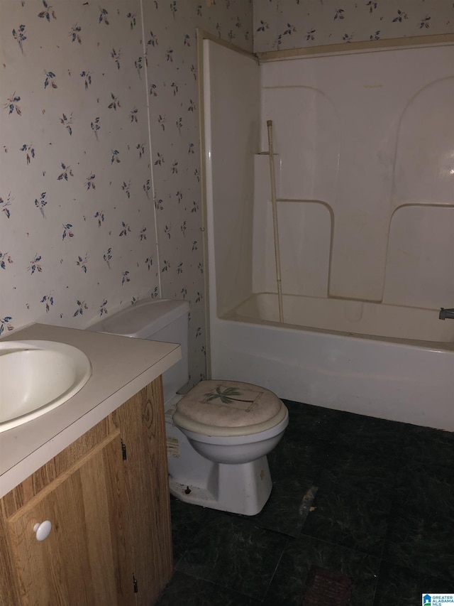 full bathroom with tile patterned floors, vanity, toilet, and shower / tub combination