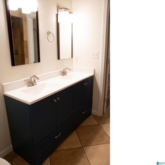 bathroom featuring tile patterned floors and vanity