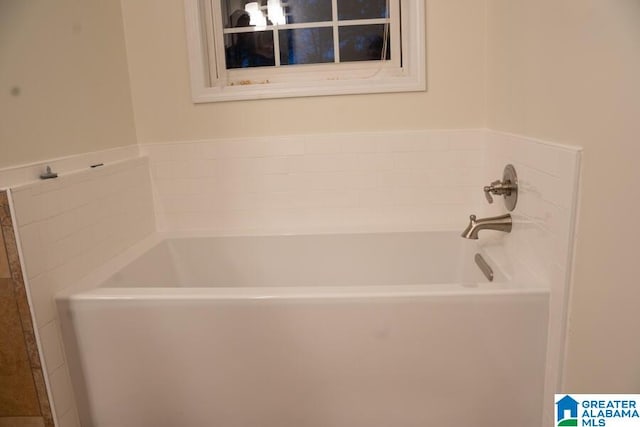 bathroom featuring a tub