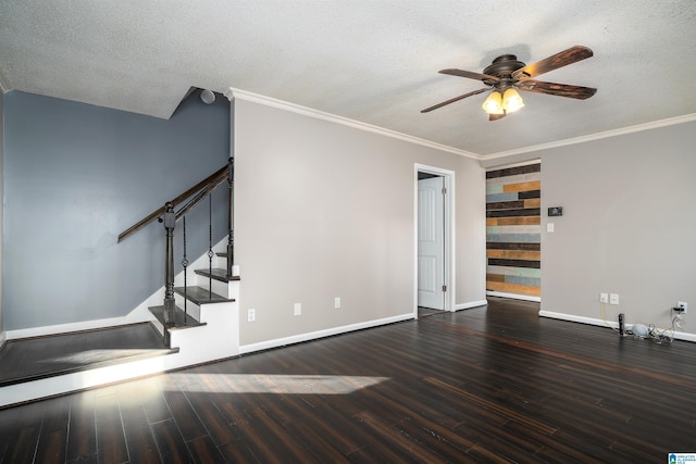 interior space with a textured ceiling and dark hardwood / wood-style flooring