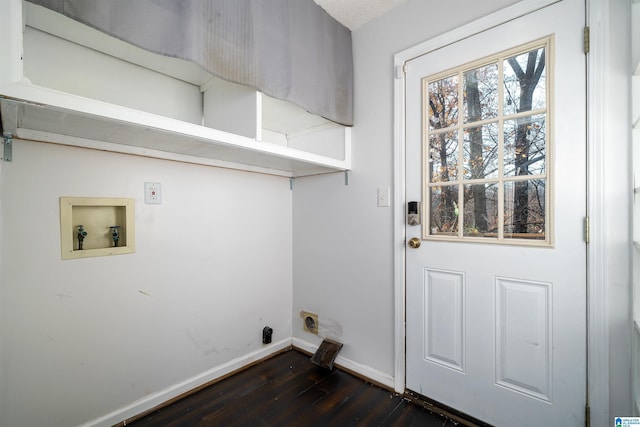 laundry room with hookup for an electric dryer, hookup for a washing machine, and dark wood-type flooring