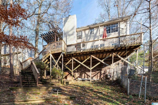 back of property with a deck