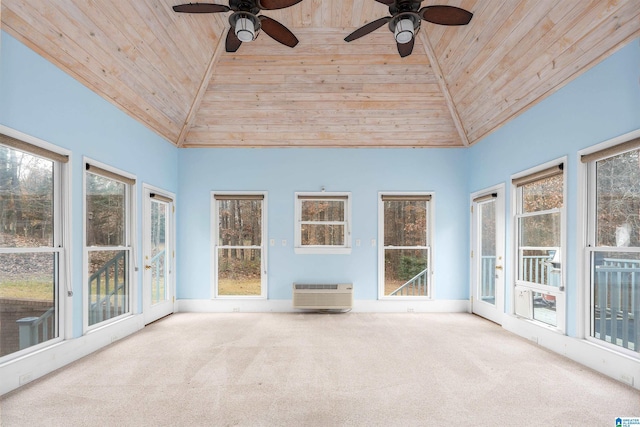 unfurnished sunroom with ceiling fan, wooden ceiling, and a wealth of natural light