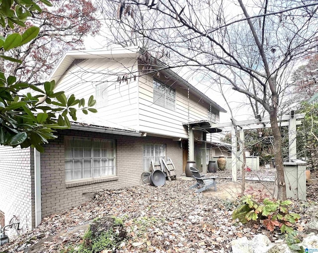 view of home's exterior featuring a patio area