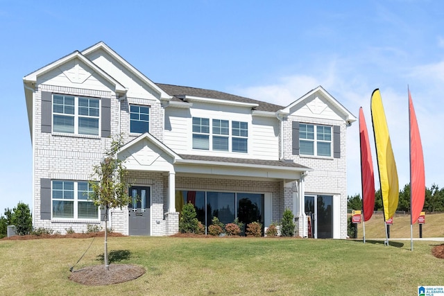 craftsman house with a front yard