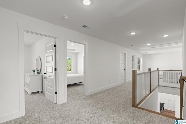 150 Sage Dr, Pell City, AL 35128 - hallway featuring an upstairs landing, recessed lighting, healthy amount of natural light, and carpet flooring