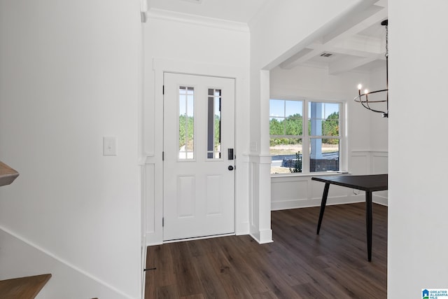 entryway featuring beam ceiling, coffered ceiling, a healthy amount of sunlight, and dark hardwood / wood-style floors