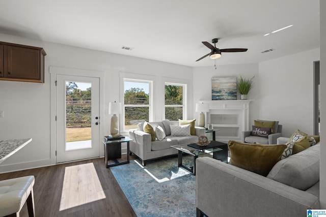 150 Sage Dr, Pell City, AL 35128 - living room featuring a ceiling fan and dark wood-style flooring