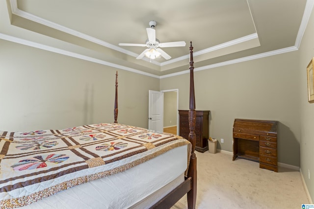 bedroom with carpet, a raised ceiling, ceiling fan, and ornamental molding