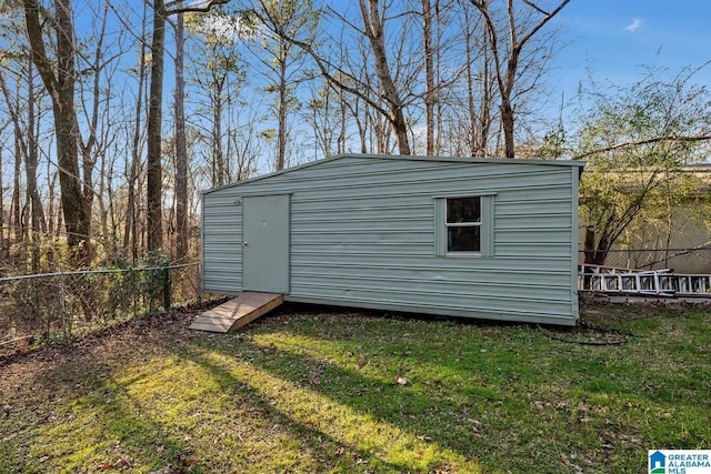 view of outdoor structure featuring a yard