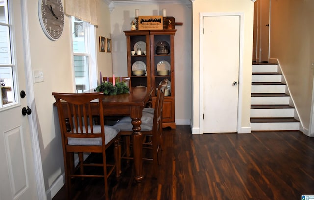 dining area with dark wood-type flooring