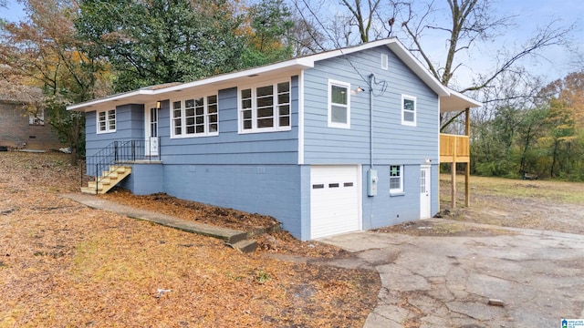 view of property exterior with a garage