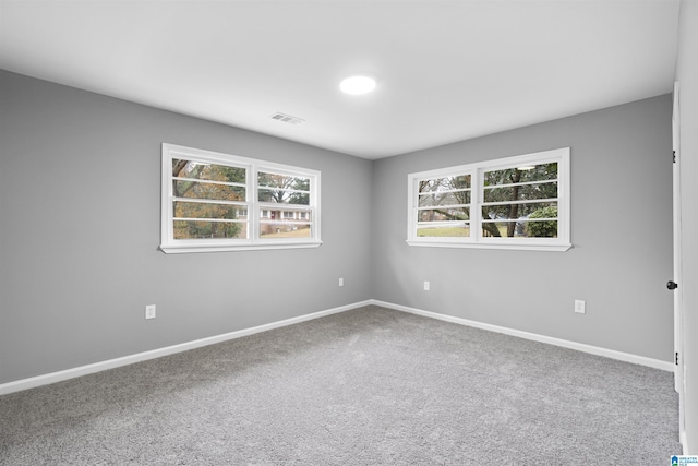 view of carpeted spare room