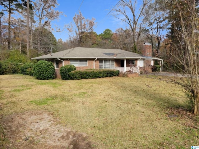 single story home with a front yard