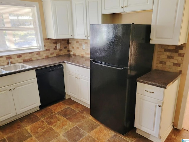 kitchen with backsplash, sink, white cabinets, and black appliances