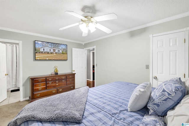 carpeted bedroom featuring a textured ceiling, ceiling fan, and ornamental molding