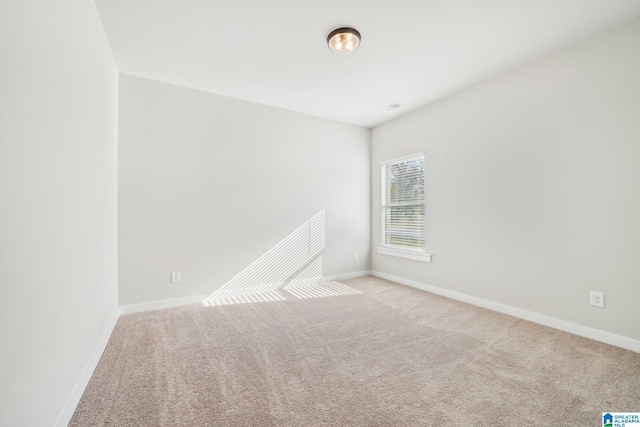 view of carpeted spare room