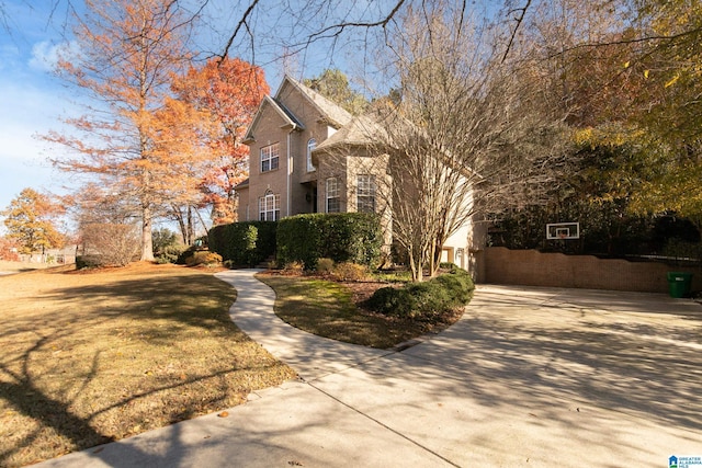 view of home's exterior featuring a yard