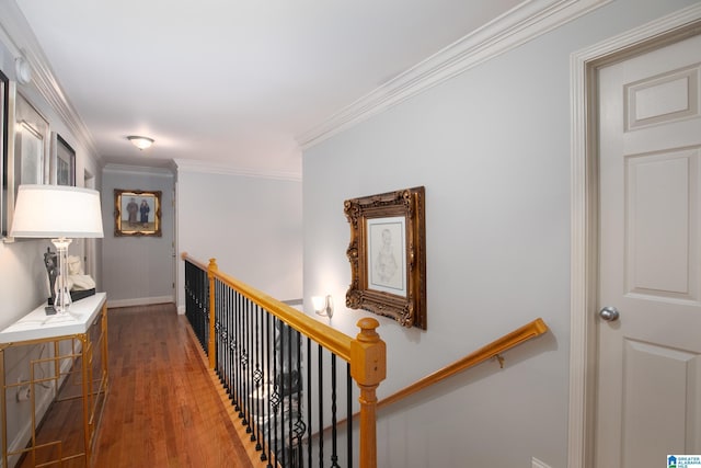 hall with crown molding and wood-type flooring