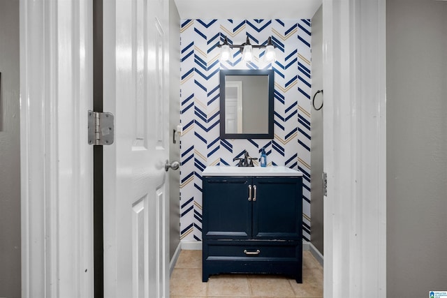 bathroom with tile patterned flooring and vanity