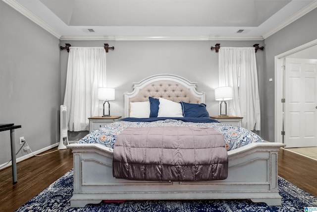 bedroom with crown molding and dark wood-type flooring