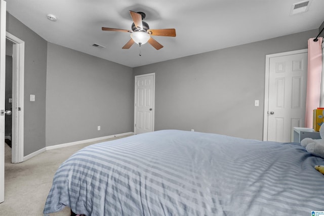 carpeted bedroom featuring ceiling fan