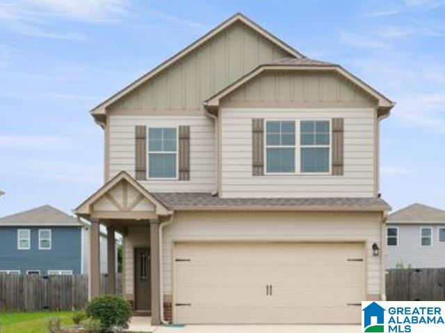 craftsman-style house featuring a garage