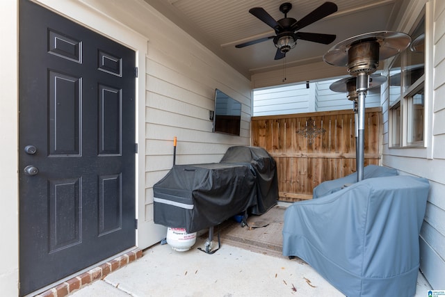 exterior space featuring ceiling fan