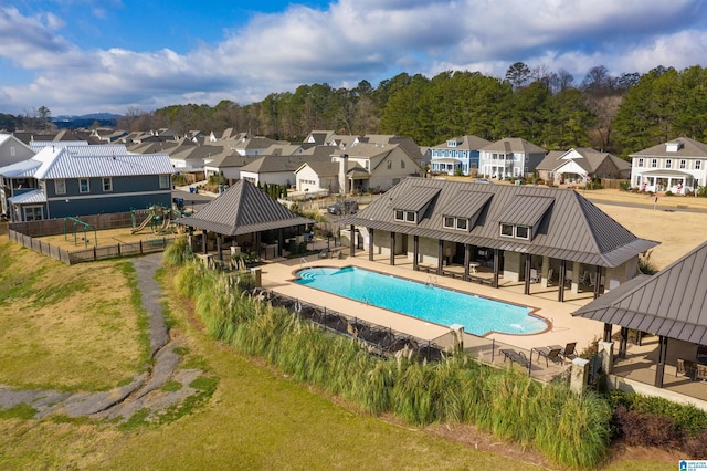 view of swimming pool featuring a gazebo and a patio