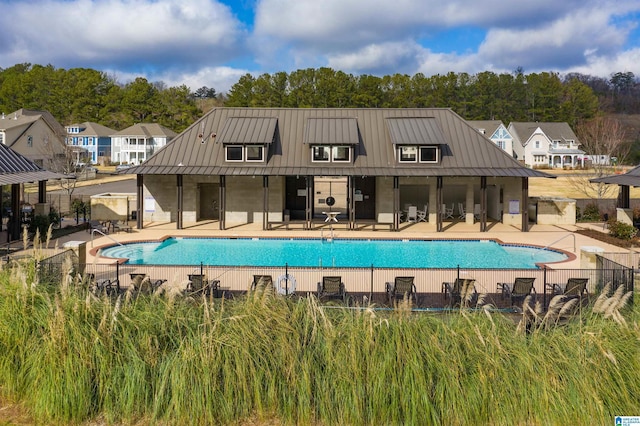 view of pool featuring a patio