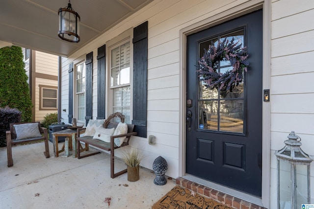 entrance to property with covered porch