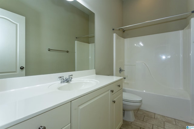 full bathroom featuring tile patterned floors, vanity, shower / bathtub combination, and toilet