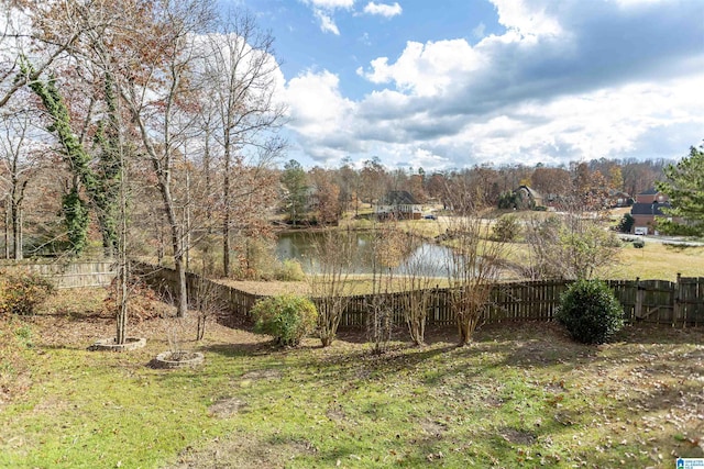 view of yard with a water view