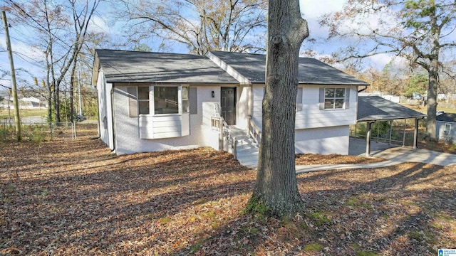 view of front facade with a carport