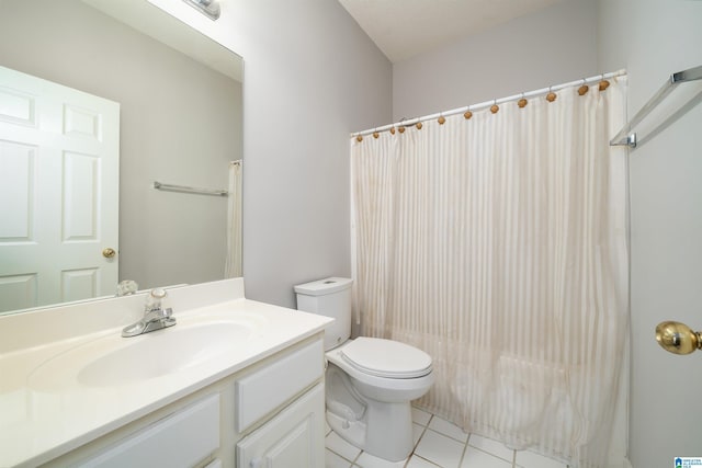 full bathroom with tile patterned flooring, vanity, toilet, and shower / bath combo