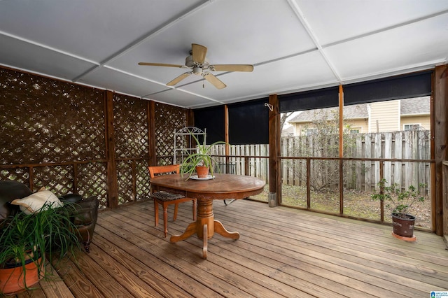 sunroom / solarium with ceiling fan