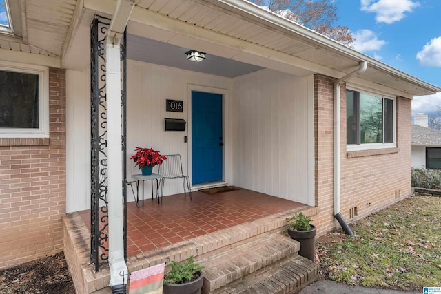 entrance to property with covered porch