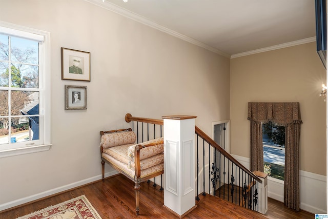 sitting room featuring crown molding and dark hardwood / wood-style floors