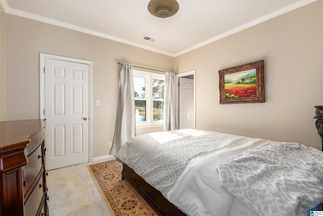 carpeted bedroom featuring crown molding