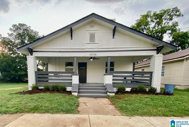 bungalow featuring ceiling fan and covered porch