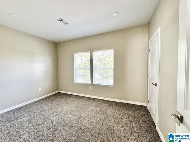 view of carpeted spare room