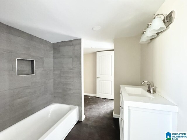 bathroom featuring vanity and concrete flooring