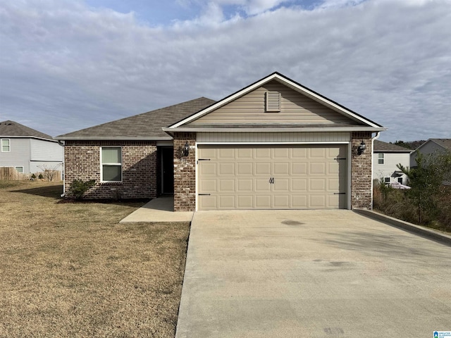 view of front of home featuring a garage and a front yard