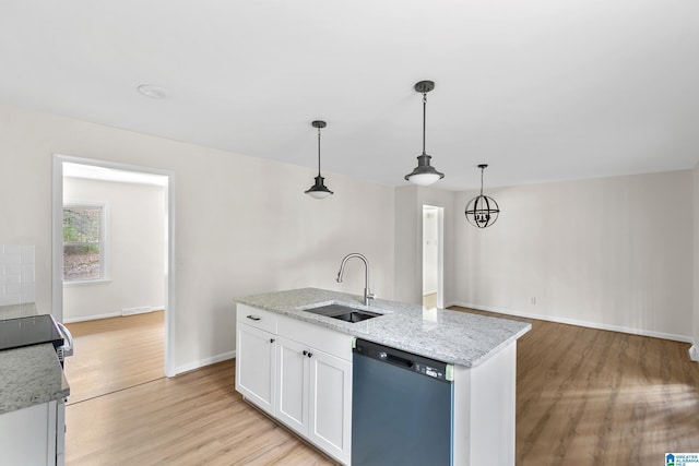 kitchen with white cabinetry, dishwasher, sink, hanging light fixtures, and light hardwood / wood-style floors