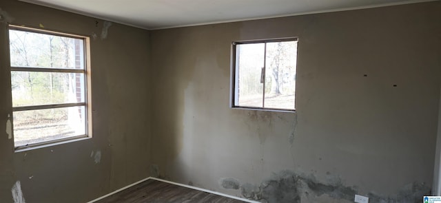 empty room featuring hardwood / wood-style flooring