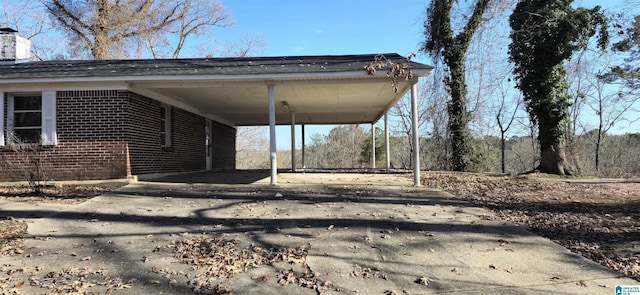 view of parking with a carport