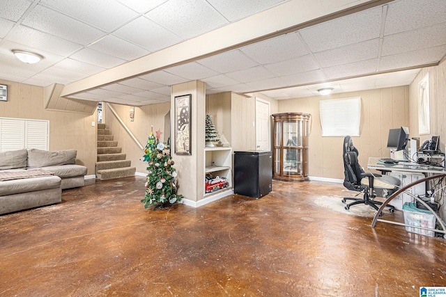 office space featuring a paneled ceiling