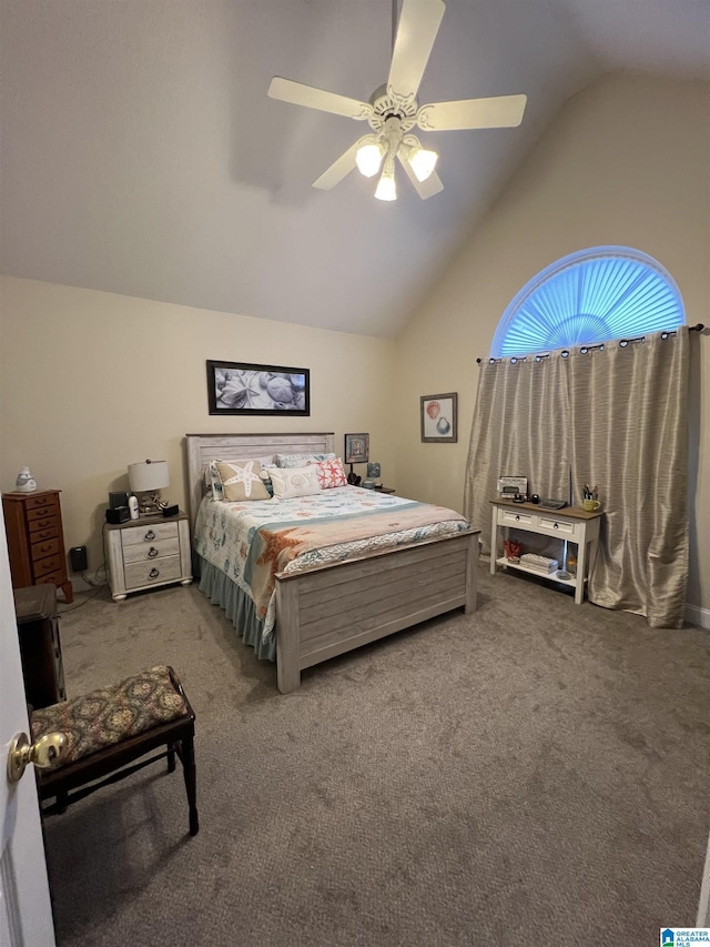 carpeted bedroom with ceiling fan and vaulted ceiling